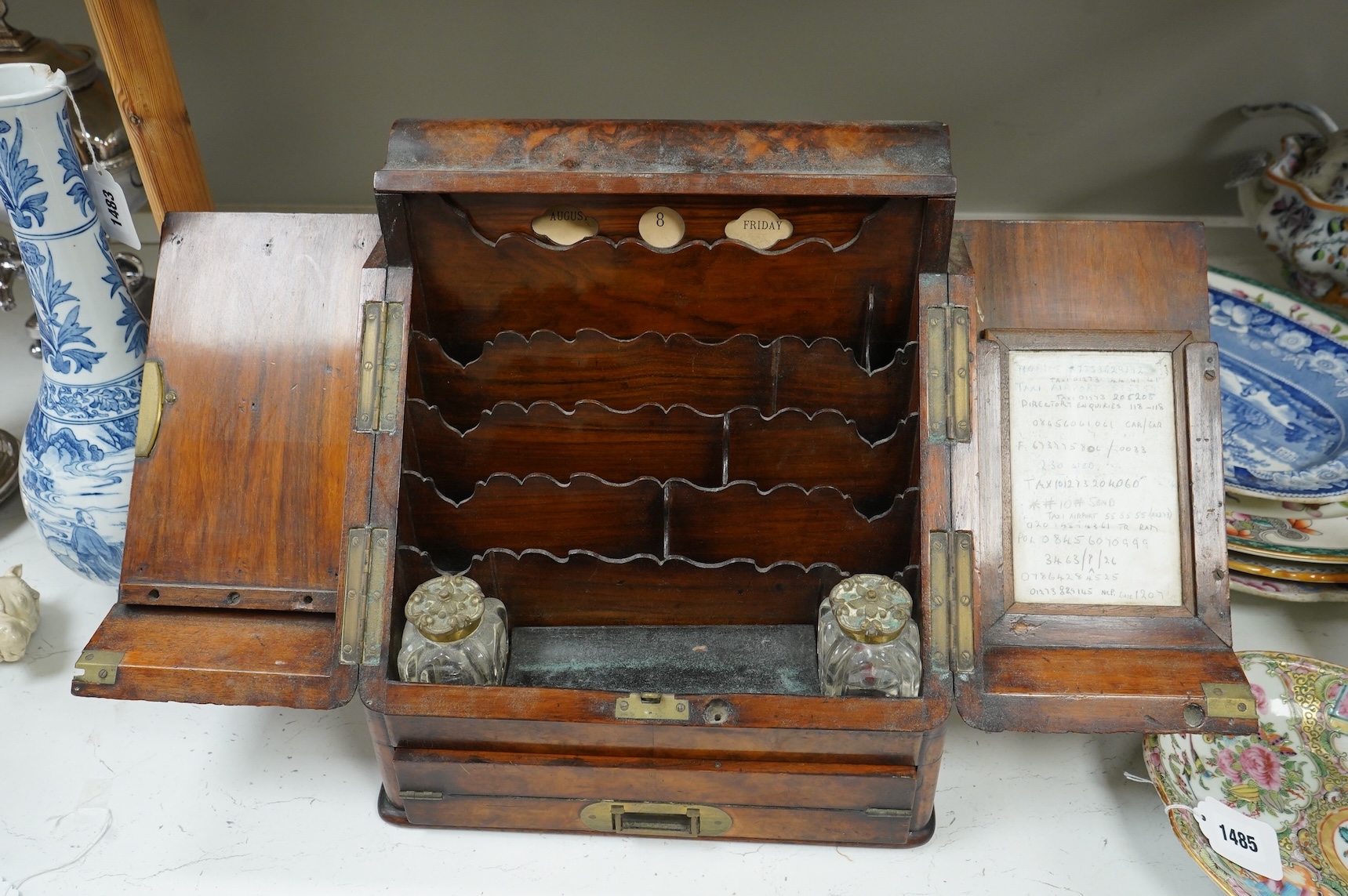 A Victorian burr wood stationary casket with calendar and two glass ink wells, 35cm high